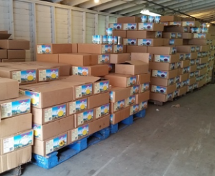 Photo of food boxes stored in a warehouse